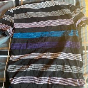 Black, white blue men’s shirt